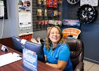 Carmen at the front desk